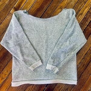 1980s style off the shoulder sweatshirt